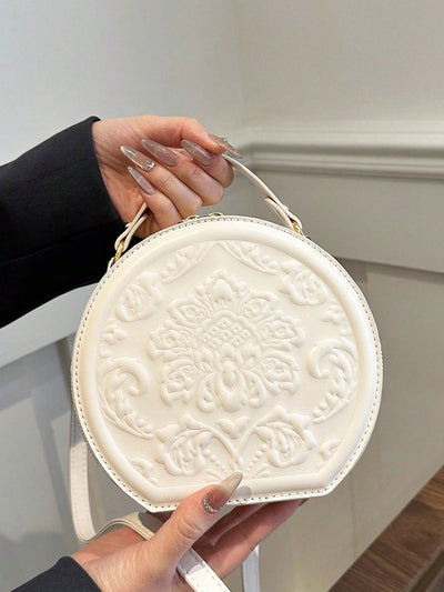 Vintage Flower Embossed Round Handbag: The Chic Commuter's Essential