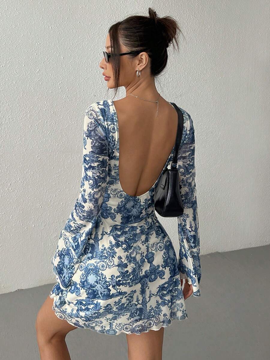 Unleash your inner fashionista with our Chic Backless Mesh Dress for Women! Adorned with flared sleeves and a unique Early Autumn Print Style, this dress will make you stand out in any social setting. The backless design adds a touch of edginess, perfect for those who dare to be different. Get ready to turn heads with this must-have dress!