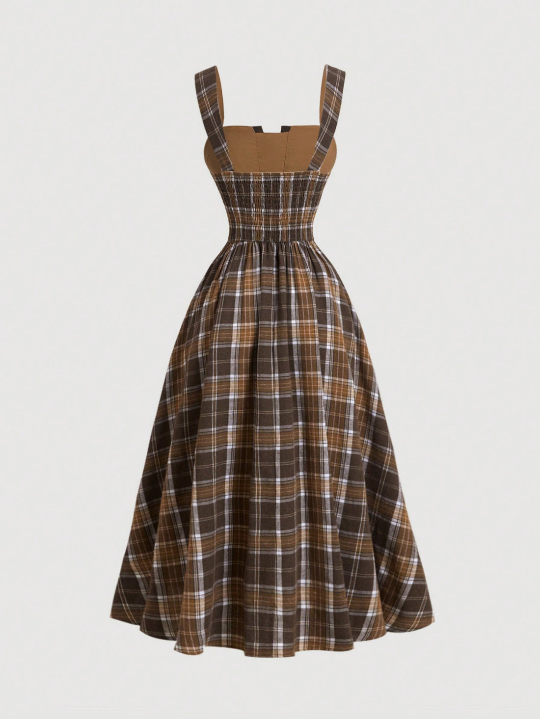 Elevate your fall wardrobe with our Vintage Chic Plaid Slip Dress. This stylish and versatile dress is the perfect addition for the season, and with its classic plaid design, it's also perfect for Halloween festivities. Made with high-quality materials, it's the perfect blend of comfort and style. Order now and stand out with a timeless look.