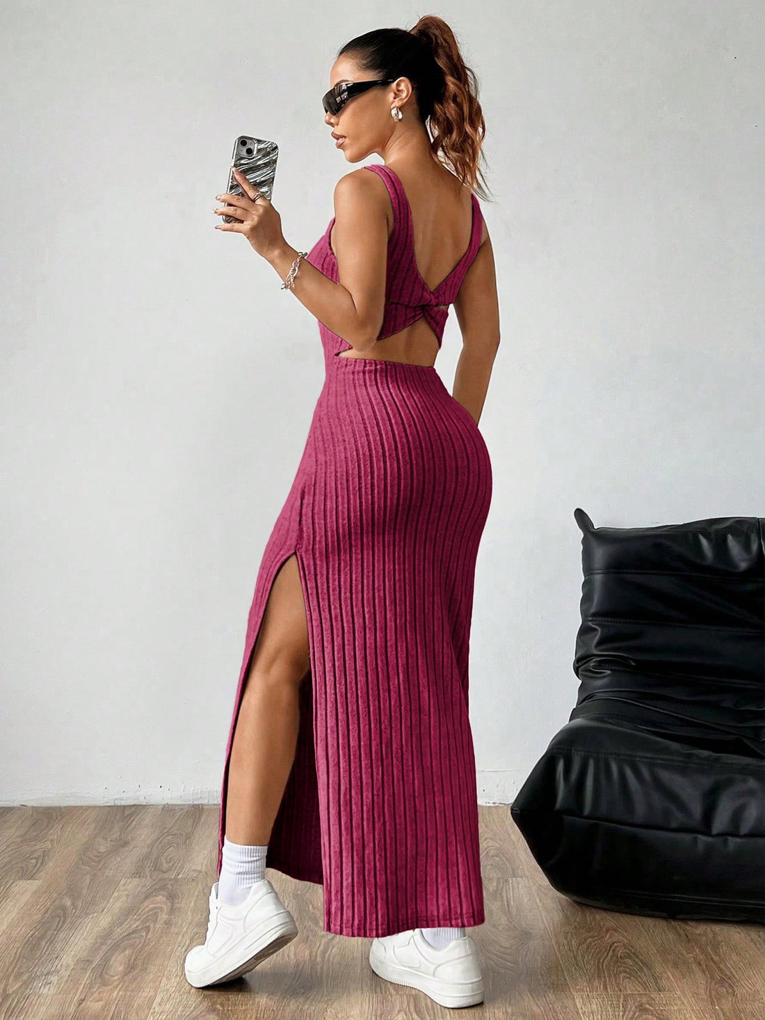 Step out in style with our Chic and Elegant Solid Color Backless Split-Thigh Sleeveless Dress. This dress boasts a timeless design that combines chic and elegance, while the solid color and backless style add a touch of boldness. With a split-thigh design and sleeveless cut, it's perfect for any occasion. Enhance your wardrobe with this must-have piece.