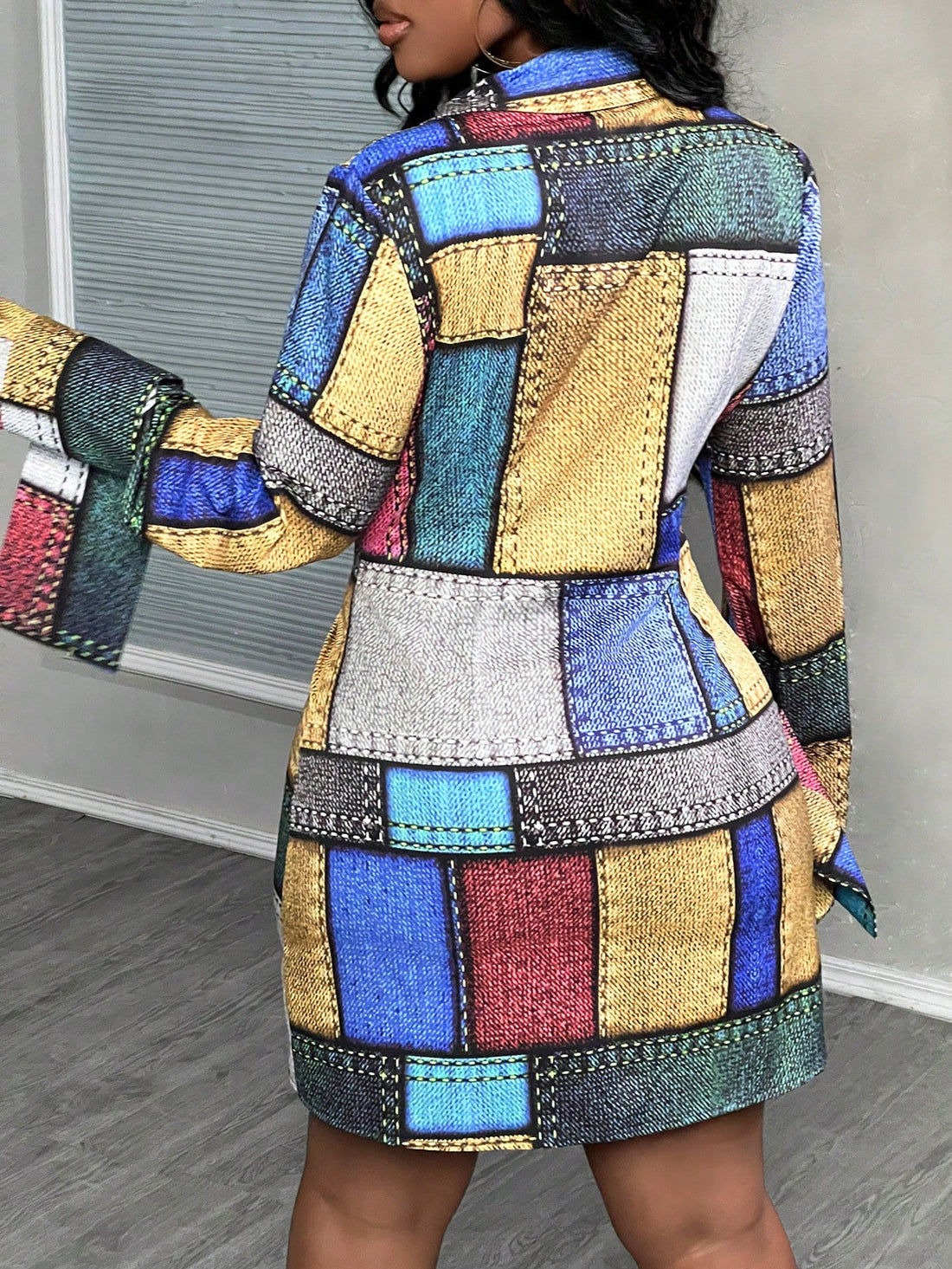 Stylishly chic, this Colorful Chic button-up mini dress is a must-have for any woman's wardrobe. Featuring a unique patchwork design, this dress will turn heads and make a statement. Made with high-quality materials, it offers both comfort and style. Perfect for any occasion, this dress is sure to become your new favorite.