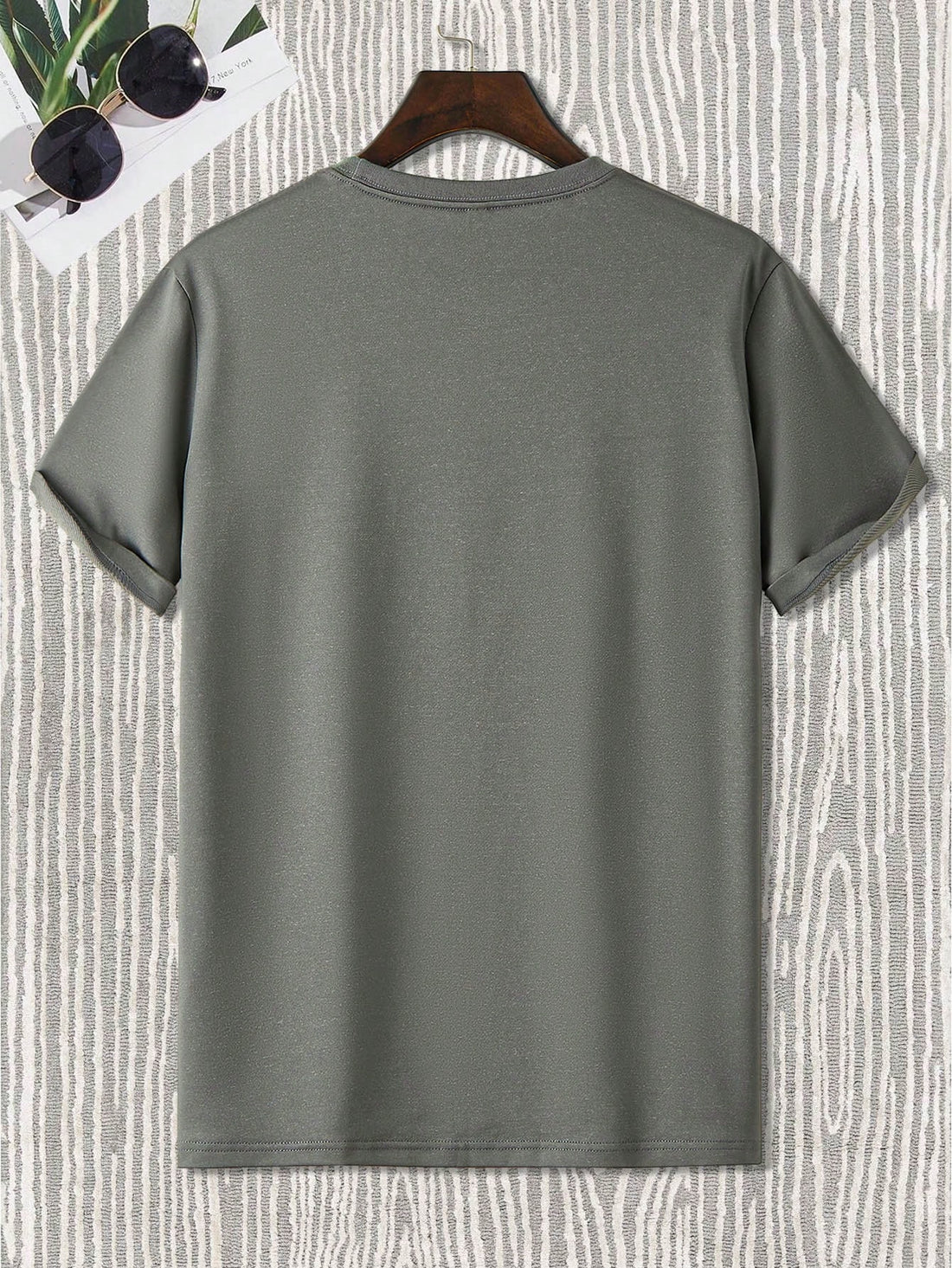 This men's summer casual t-shirt features a unique slogan and an illusional figure print, making it a trendy and eye-catching addition to any wardrobe. With the lightweight and breathable fabric, it provides comfortable wear for any summer occasion. Stand out from the crowd with this stylish and thought-provoking t-shirt.