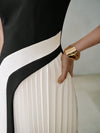 Modern Chic: Sleeveless Pleated Dress with Premium Color Block Design