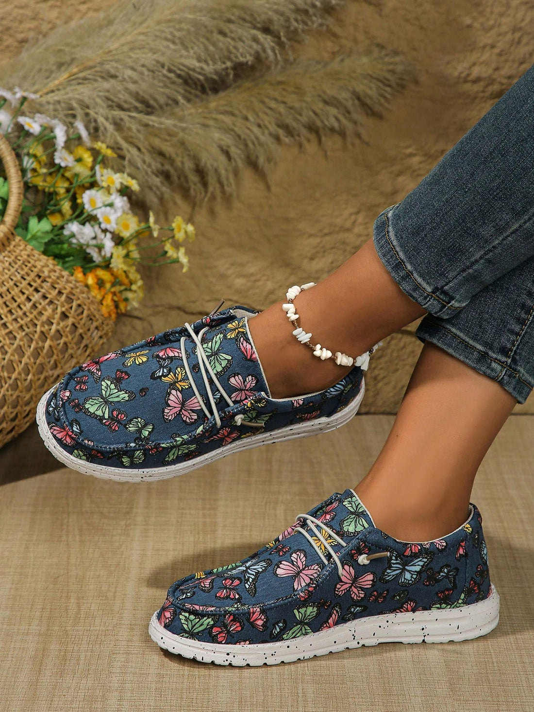 Introducing our Chic Floral Slip-On Shoes, inspired by European and American style. With a sleek and modern design, these shoes are perfect for any fashion-forward individual looking to add a touch of sophistication to their wardrobe. Step into style and embrace the best of both worlds with these slip-ons!