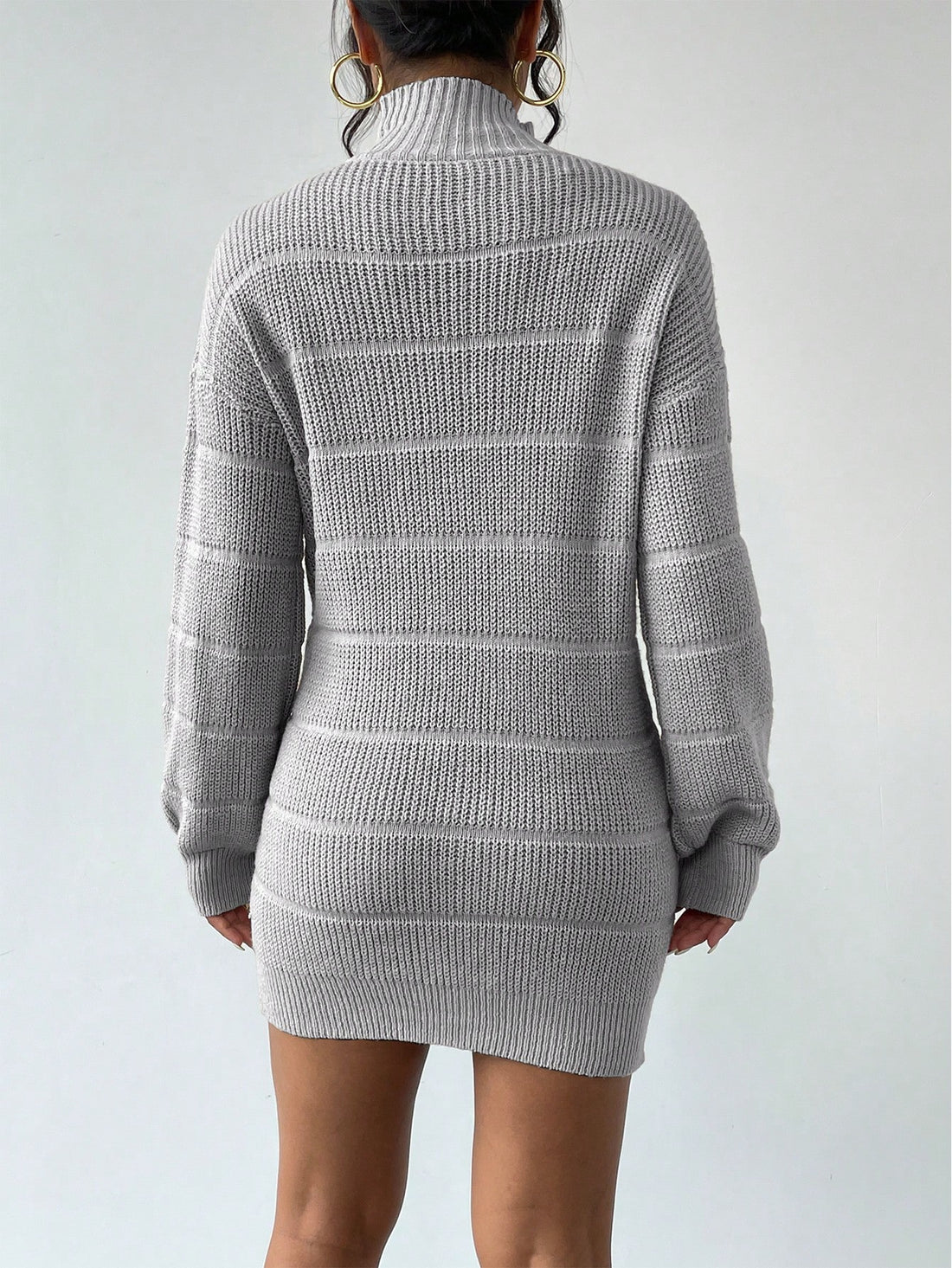 Stay warm and stylish this winter with our Chic & Cozy High Neck Textured Knit Sweater Dress. The soft knit material and high neck provide ultimate comfort, while the textured design adds a touch of sophistication. Perfect for any occasion, this dress is a must-have for your wardrobe.