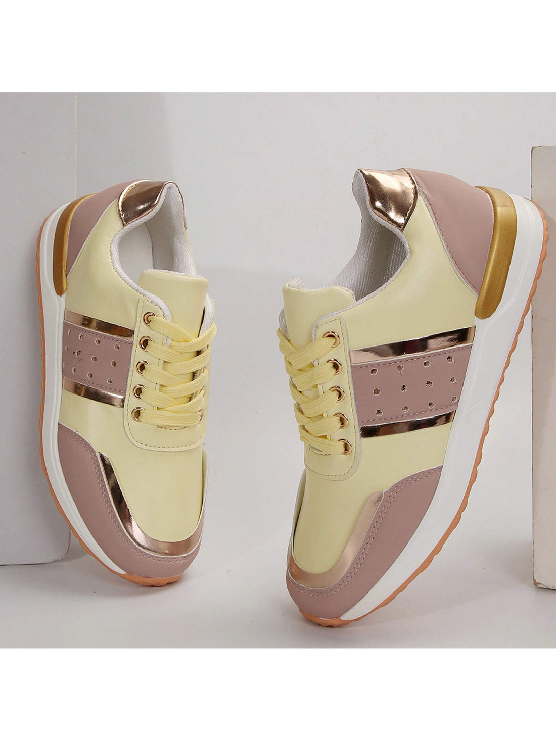 These Colorblock Platform Sneakers offer both style and support. With their slip-resistant design, you can confidently take on any terrain. Plus, the colorblock pattern adds a trendy touch to any outfit. Stay fashionable and safe with these must-have shoes.