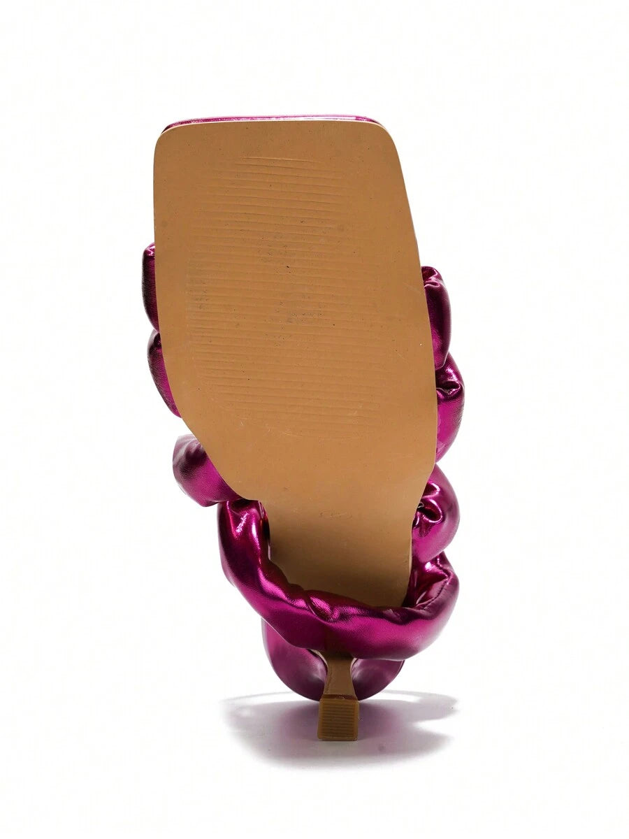 Step into the spotlight with these shimmering metallic faux leather slip-on heeled sandals. Perfect for festival fun, their easy slip-on design keeps you dancing all day while the sparkling finish adds a playful pop to any outfit. Elevate your style effortlessly and let your feet do the talking!