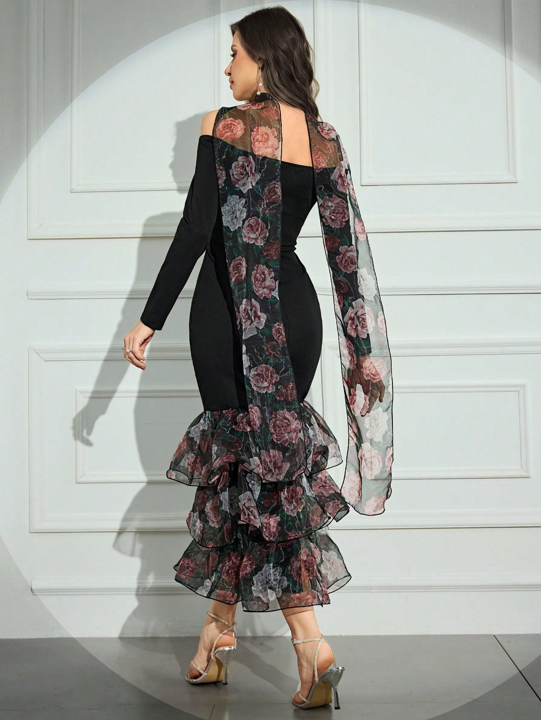 Make a statement in this stunning floral evening dress that's equal parts sophisticated and show-stopping. The off-shoulder neckline and long sleeves strike that perfect balance between elegance and allure, while the fitted silhouette hugs your curves beautifully. The dramatic fish tail hem adds a touch of glamour and movement with every step. Whether you're heading to a gala, wedding, or special night out, this dress transforms you into the most captivating person in the room. Timeless, flattering, and abs