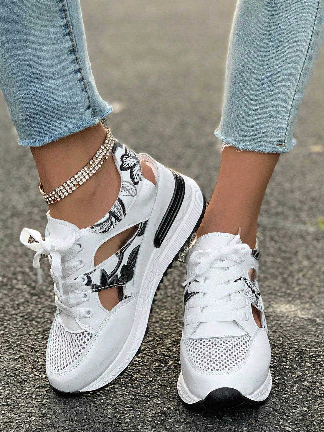 Elevate your style (literally) with these sporty wedge sandals. The adjustable straps and breathable mesh design provide comfort and support, while the unique design will make you stand out in any crowd. Perfect for any fashion-forward woman who wants to add a touch of playfulness to her wardrobe.