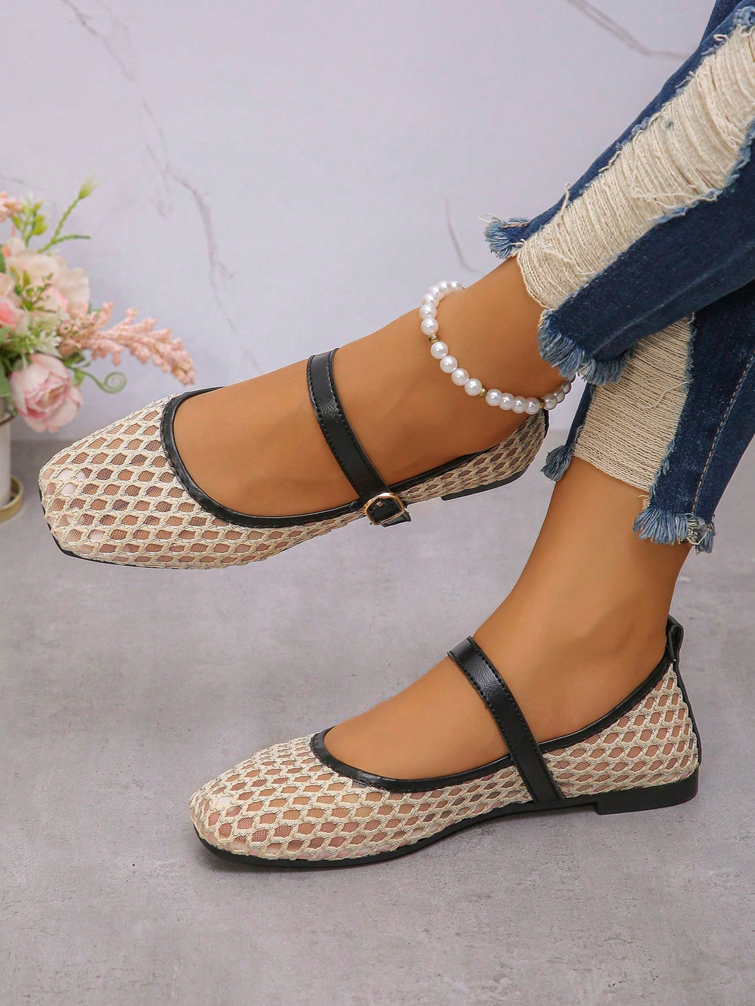 Step into style and comfort this summer with our Versatile Beige Grid Mary Jane Flats! These stylish flats are the perfect addition to your wardrobe, offering both fashion and comfort. With a trendy grid design and the classic Mary Jane style, these shoes are a must-have for any fashion-forward individual. Don't sacrifice style for comfort - get the best of both worlds with our Summer Essentials!