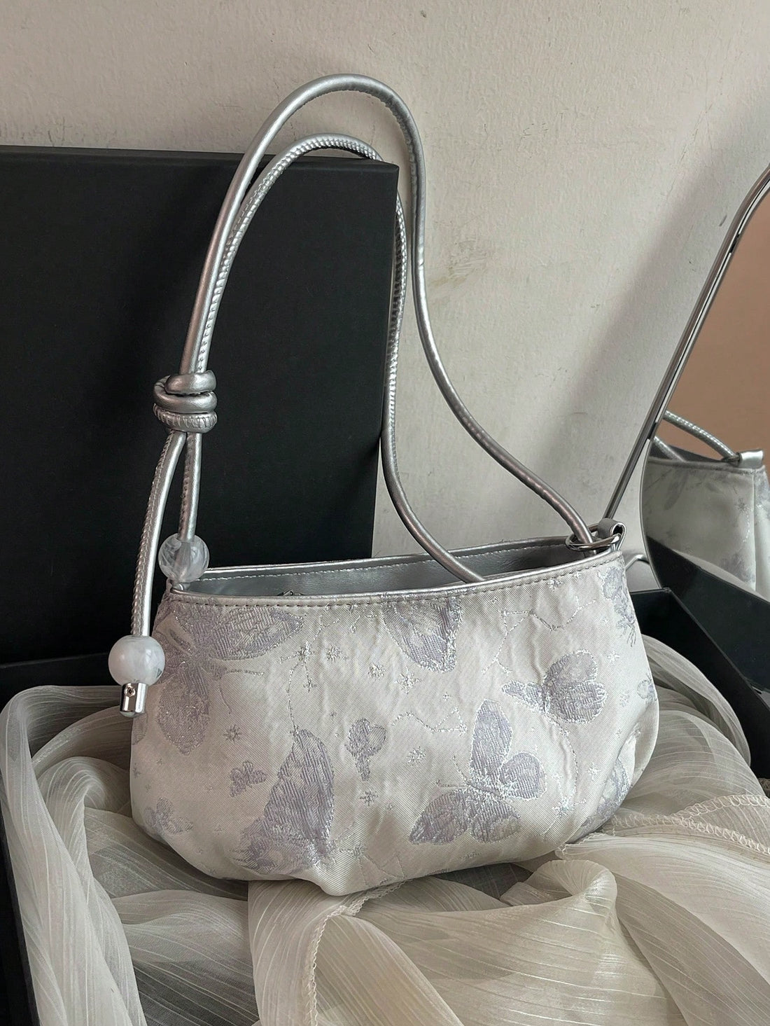 Introducing the perfect accessory for the modern woman: our 2024 Summer Fashion Floral Shoulder Bag. Crafted with chic floral design and a compact size, this bag is ideal for the office lady. Stay stylish while carrying your essentials with ease.