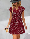 Elegant V-Neck Short Sleeve Dress with Allover Text Print and Waist Tie