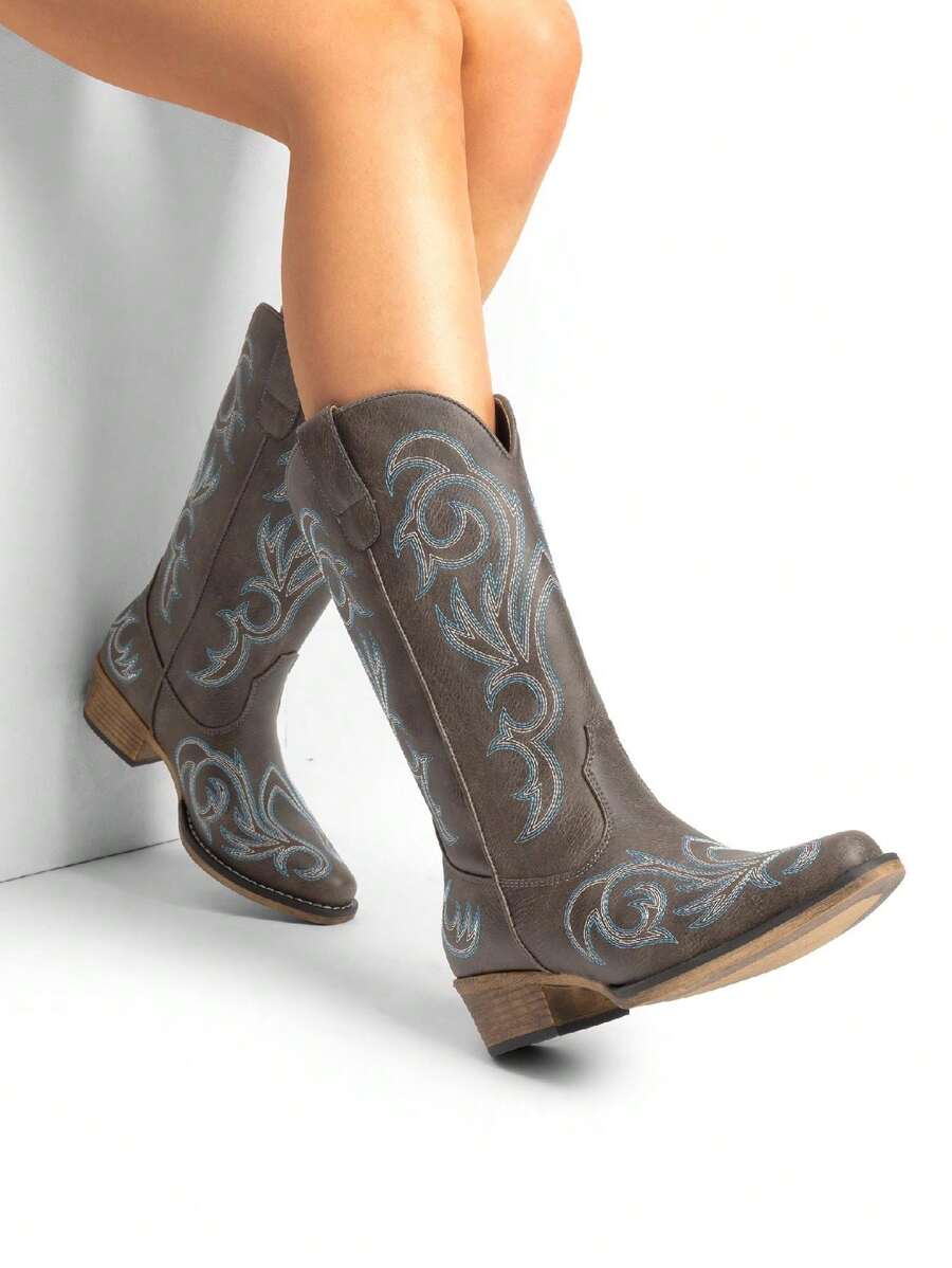 Heel view of Stylish Women's Mid-Calf Cowgirl Boots with Chunky Heel and Embroidery for Festivals and Parties for punk motorcycle boot styling