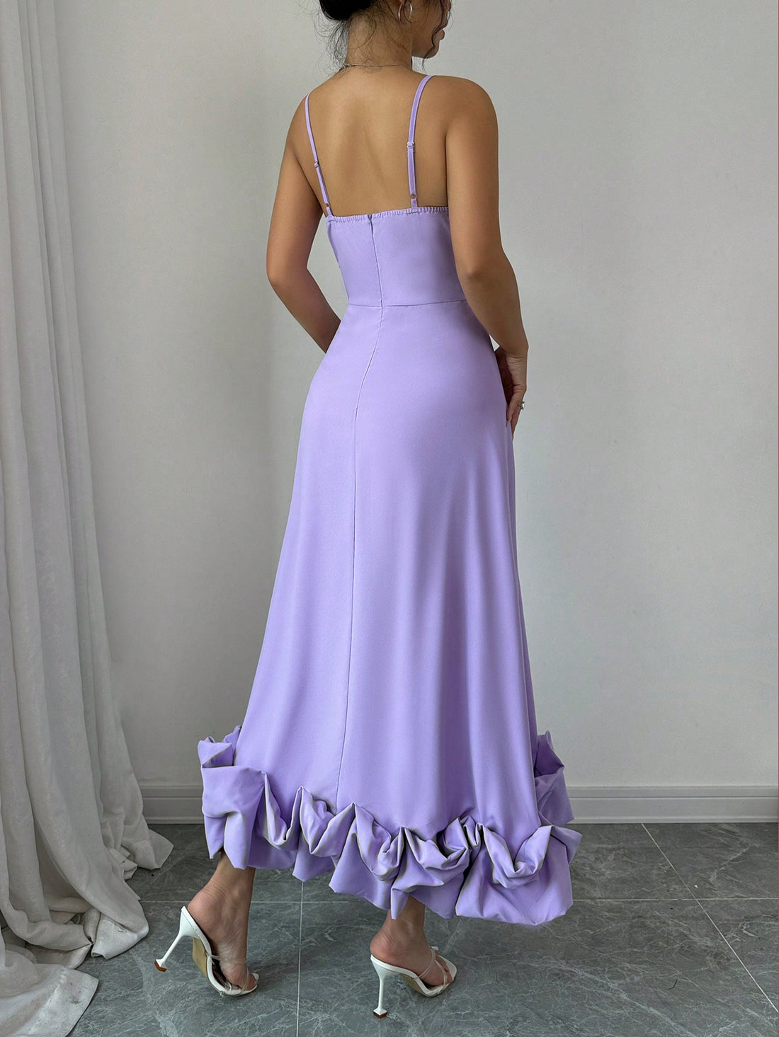 This stylish and elegant bubble dress features a chic sling hem design, adding a unique and fashionable touch to your wardrobe. Crafted with precision and attention to detail, this dress exudes confidence and sophistication. Elevate your style with this must-have piece.