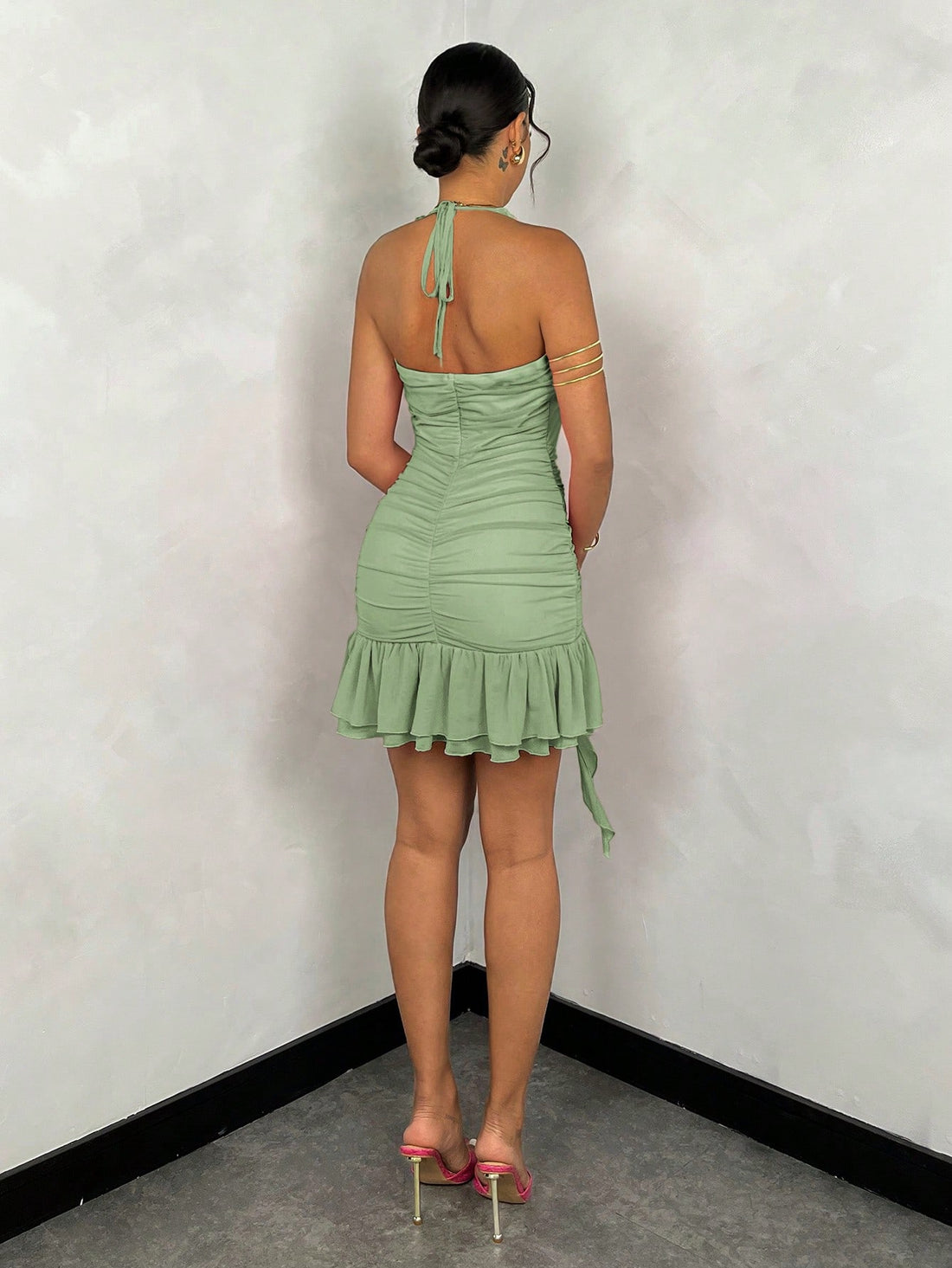 Escape from the summer heat in style with our Chic Summer Escape dress! Featuring a halter neck and ruffled mesh design, this dress is perfect for any occasion. Show off your playful side with the solid mint green color. Stay cool and chic all season long!