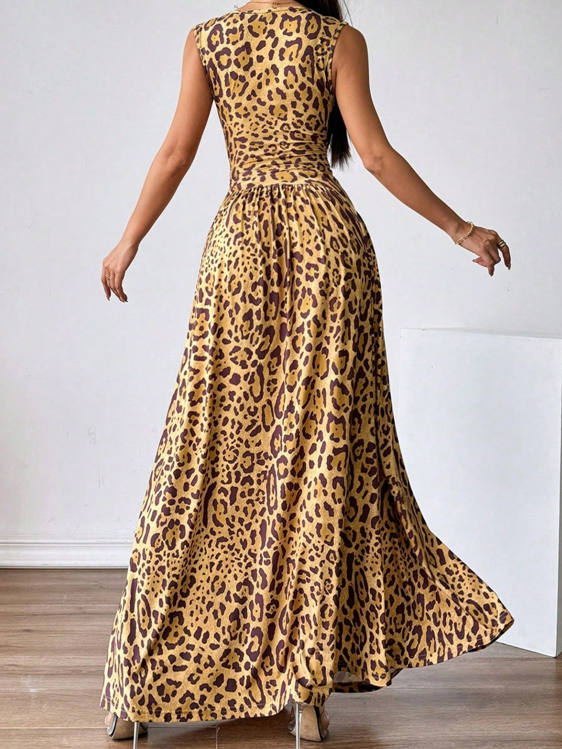 Step out in style in our Wild Elegance: Leopard Print Sleeveless Maxi Dress! Perfect for any occasion, this dress exudes confidence and elegance with its eye-catching leopard print and flattering sleeveless design. Made from high-quality materials, this dress will keep you comfortable and stylish all day long. Make a statement and stand out from the crowd with our Wild Elegance dress.