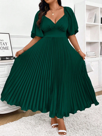 Chic Elegance: Plus Size Pleated Midi Dress with Deep V-Neck and Ruched Sleeves