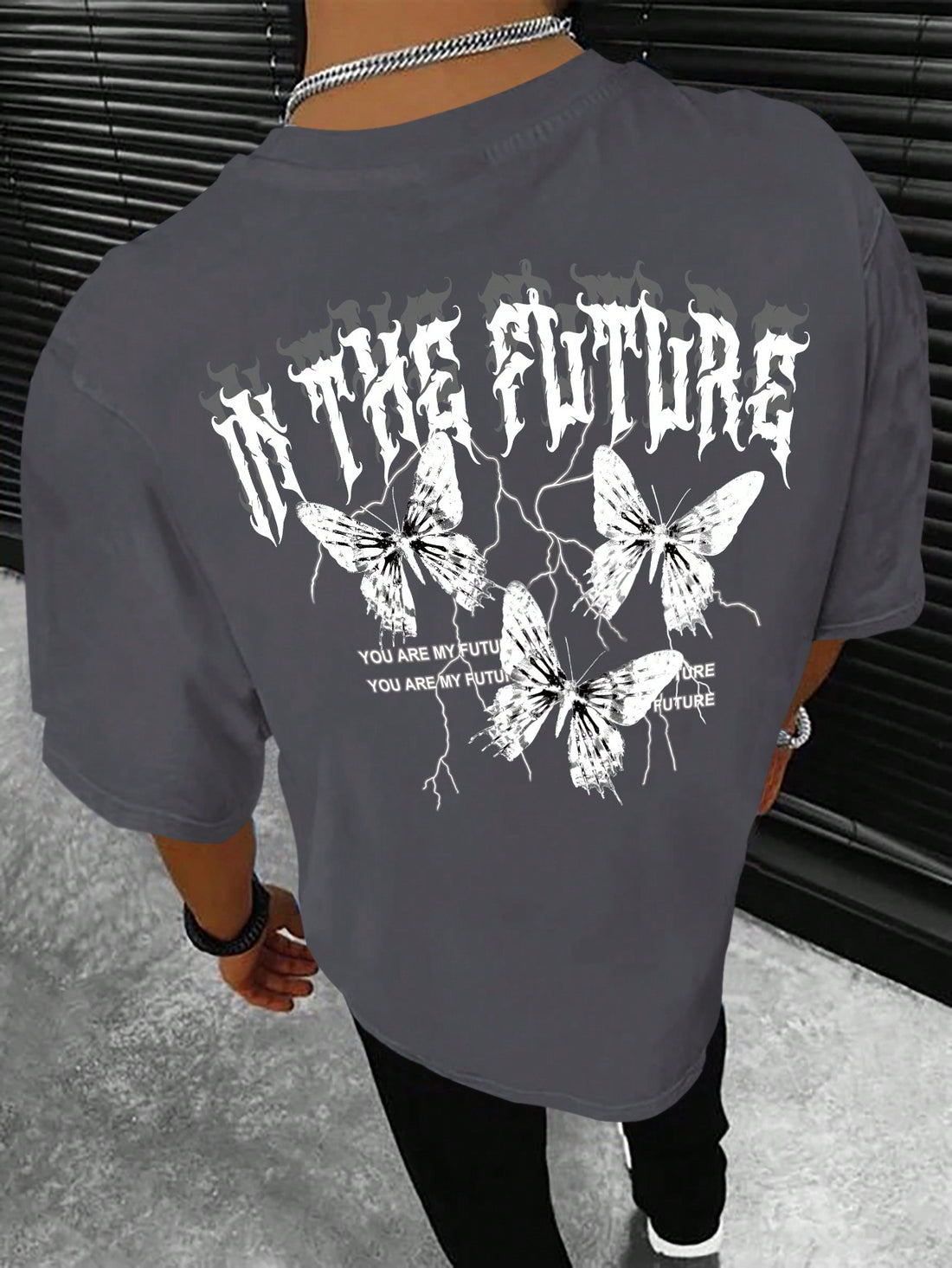 Step up your style game with our sleek and stylish Men's Butterfly adn Slogan Graphic Tee. Made from high-quality materials, this statement piece showcases a bold butterfly design and a powerful slogan. Perfect for any occasion, this tee will add a touch of sophistication to your wardrobe.