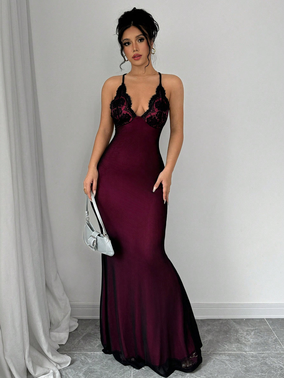 Dress to impress with the Elegant Elenzga V-Neck Lace Backless Mermaid Bodycon Maxi Dress. The intricate lace and backless design add a touch of elegance, while the mermaid silhouette flatters your figure. Perfect for any special occasion, this dress will make you stand out from the crowd.