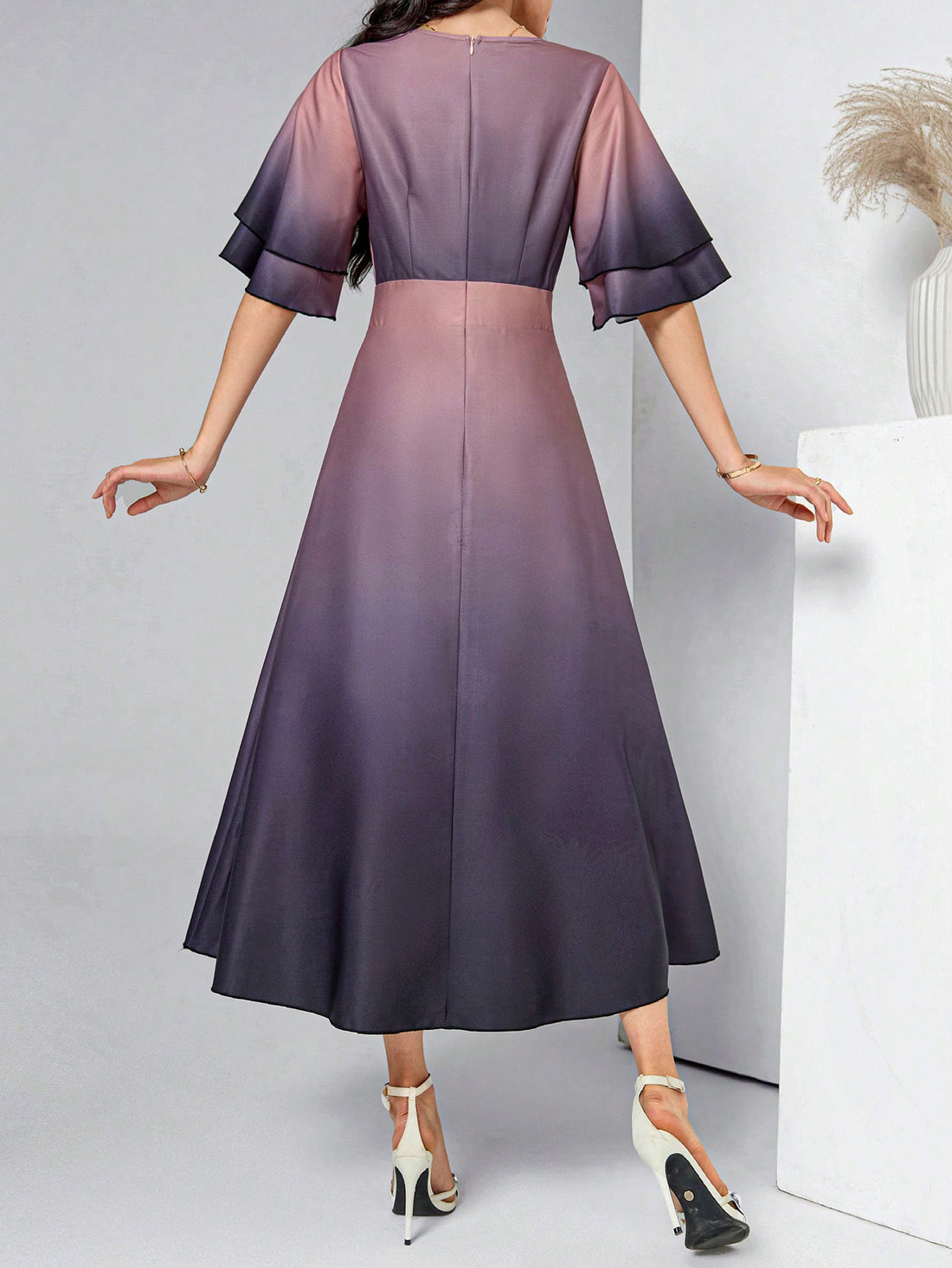 Look effortlessly stylish with our Chic Summer Vibes dress. The elegant ombre design and v-neckline flatters your figure while the ruffle hem adds a touch of femininity. Perfect for any summer occasion, this dress will keep you cool and fashionable all day long.