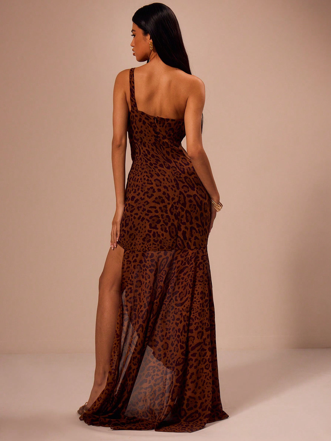 Step into the spotlight this season with this playful yet elegant animal print maxi dress. Its flattering cut-out details add just the right amount of flirty charm, perfect for spring and summer holiday parties. Flowing effortlessly, it promises comfort and style, making every celebration feel that much more special.