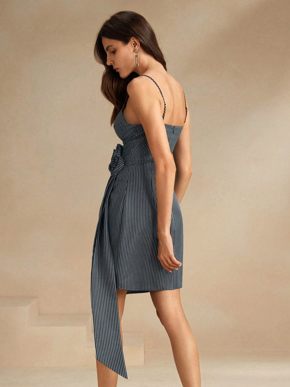 Get ready to turn heads this summer with our Chic Striped Dress! This playful yet stylish dress features an asymmetric hem and 3D floral details, perfect for adding a touch of fun to your wardrobe. Whether you're hitting the beach or attending a summer soiree, this dress is sure to make a statement.