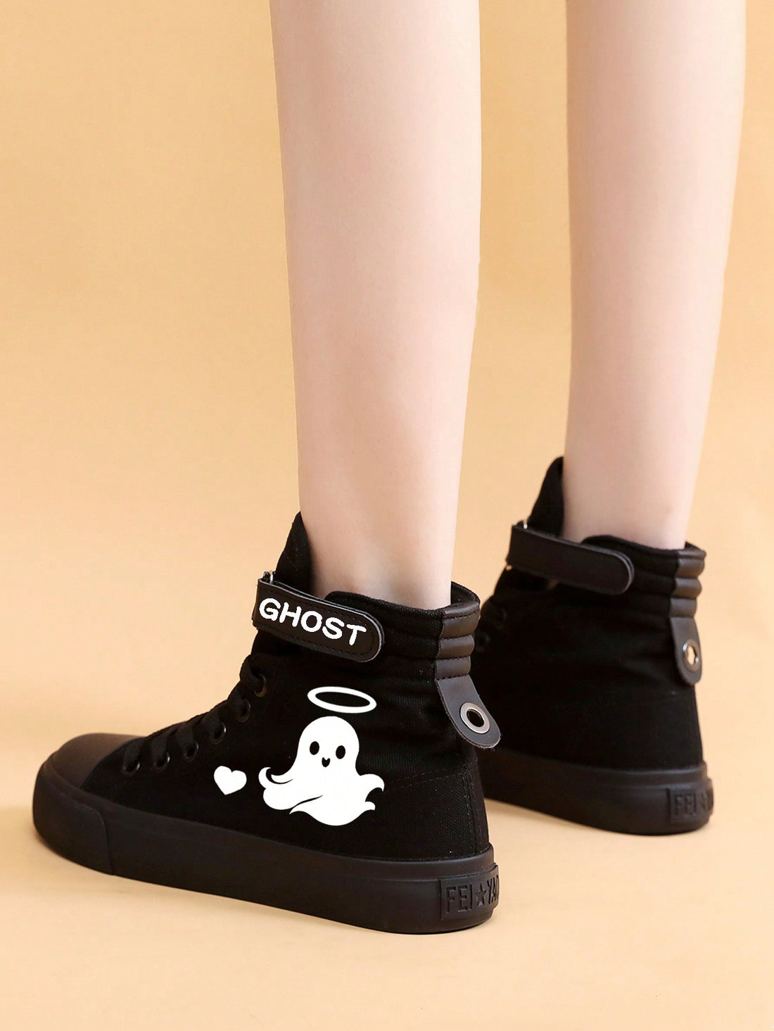 Boost your spooky style with our Halloween edition Glow-In-The-Dark Ghost Pattern High-Top Sneakers! Perfect for any Halloween costume or themed event, these sneakers feature a hauntingly cool ghost pattern that glows in the dark. Comfortable, stylish, and unique - these sneakers are a must-have for any Halloween enthusiast.
