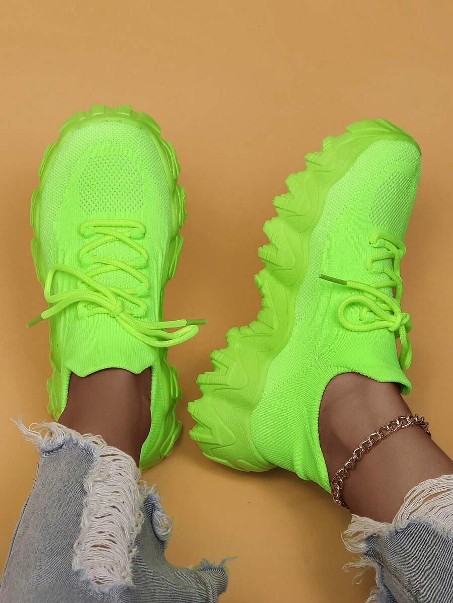 Step into summer with these playful lace-up sneakers. Lightweight and breathable, they're perfect for all your casual adventures. Whether you're running errands or hitting the trails, these shoes will keep you comfortable and stylish. Don't miss out on these must-have summer kicks!