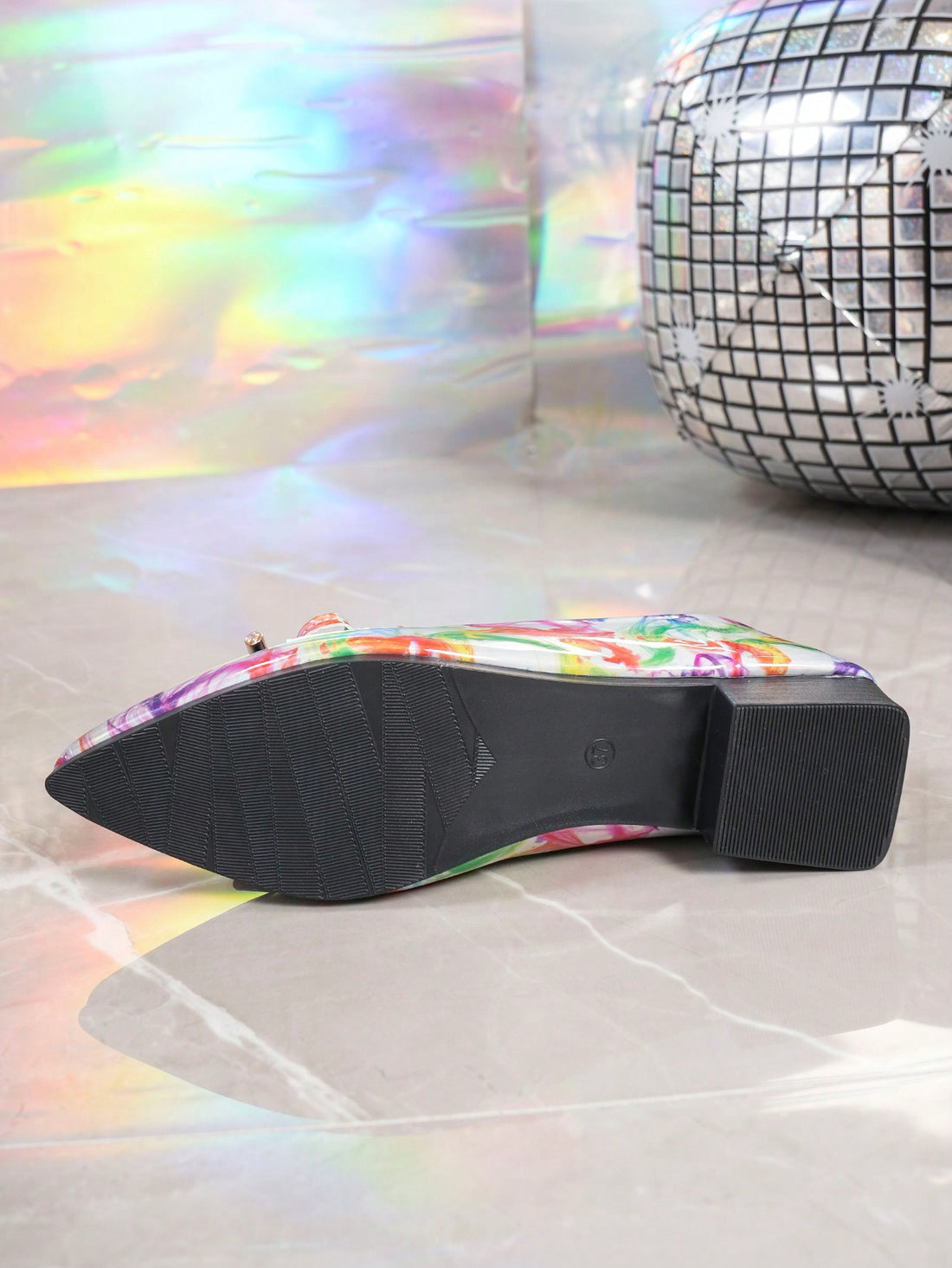 Experience vintage style with a modern twist in our Vintage Chic loafers. The colorful chunky heel adds a touch of playfulness to these classic shoes, while maintaining a comfortable fit for all-day wear. Perfect for a casual yet chic look.