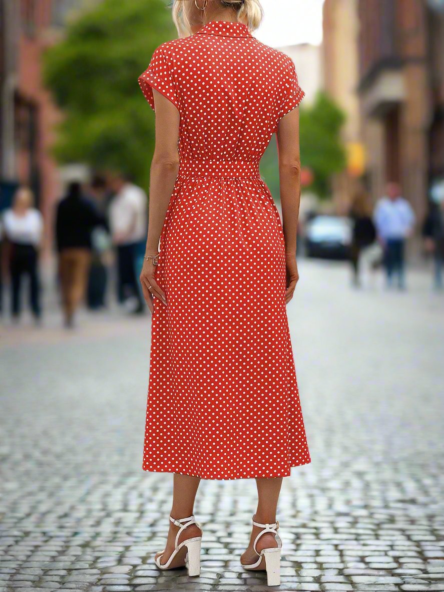 Get ready to turn heads this summer with our Polka Dot Perfection dress! Made for the classic woman, this belted dress features a stylish thigh-split design. Stay cool and chic in this must-have summer dress.