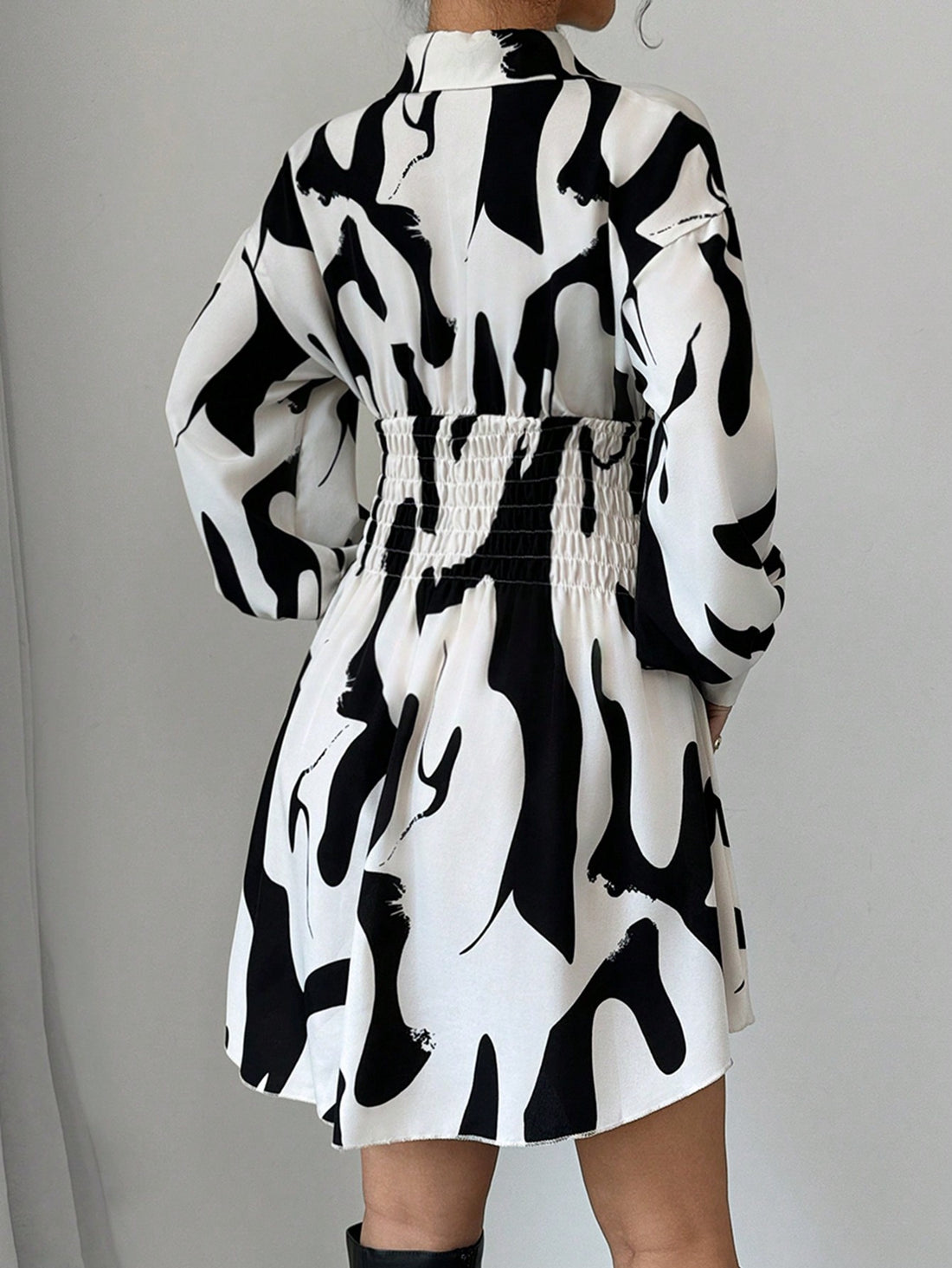 Elevate your style with Floral Elegance, the perfect blend of sophistication and comfort. This long sleeve button-up casual dress features a beautiful floral print, adding a touch of elegance to your wardrobe. Its versatile design allows for countless styling options, making it a must-have for any fashion-forward individual. Plus, the high-quality fabric ensures long-lasting wear. Upgrade your look with Floral Elegance today.