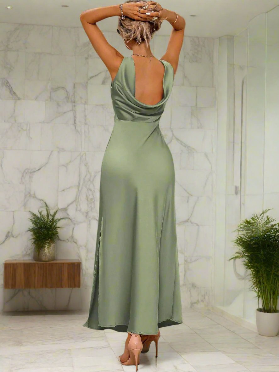 Effortlessly elegant, this women's dress features a backless design and a draped, high slit sleeveless style. Perfect for special occasions, this dress exudes confidence and sophistication. Show off your curves and make a statement in this stylish and chic piece.