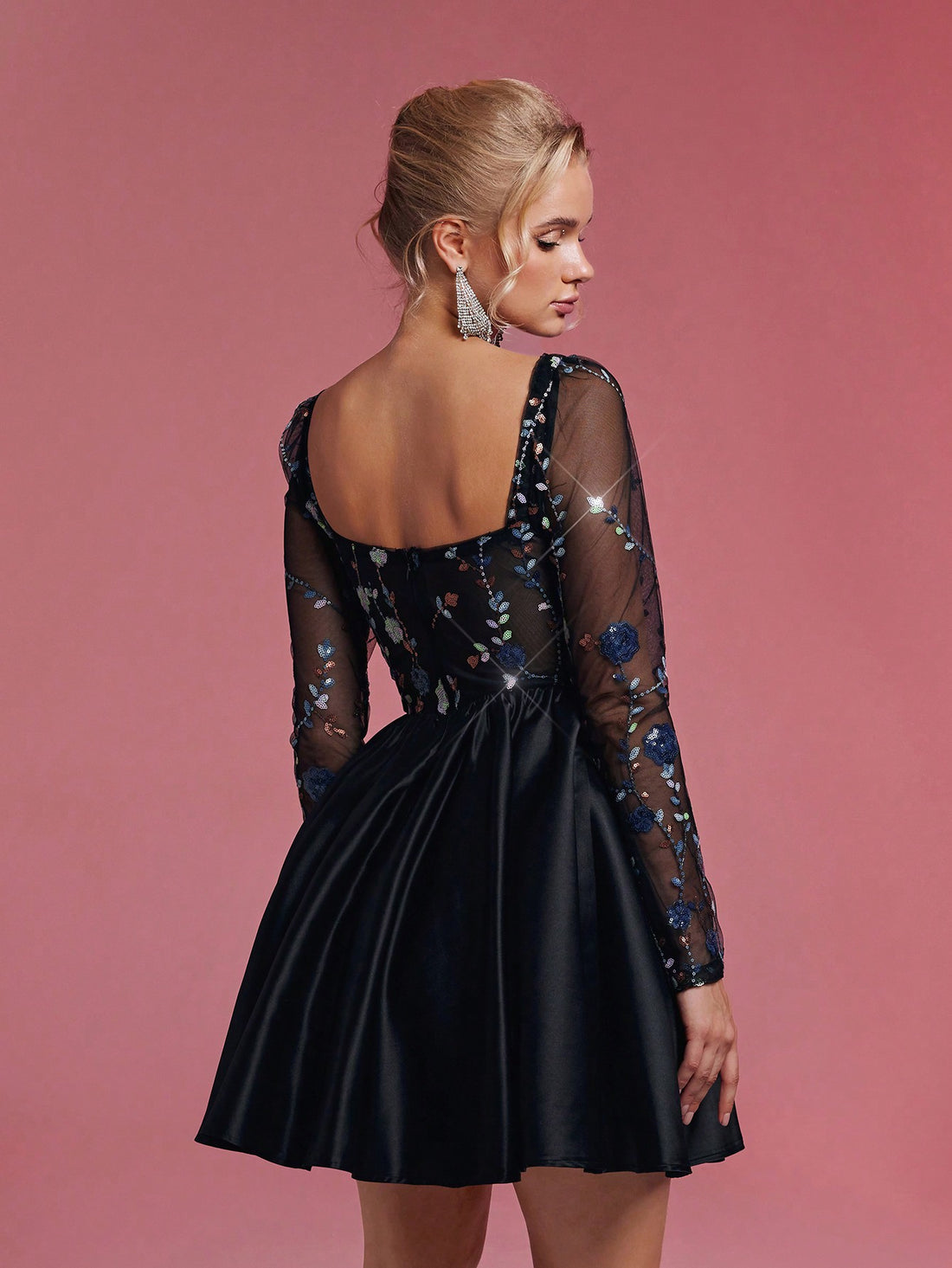 Turn heads at every event with this Elegant Black Sheer Floral Beaded Corset Cocktail Dress. Its delicate sheer fabric and intricate floral beadwork create a stunning look perfect for weddings, proms, or any special occasion. The corset design adds a flirty touch while flattering your silhouette, making you feel confident and ready to dance the night away.