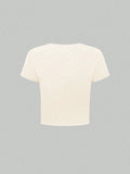 Back studio view of plain apricot cropped short-sleeve crew-neck T-shirt