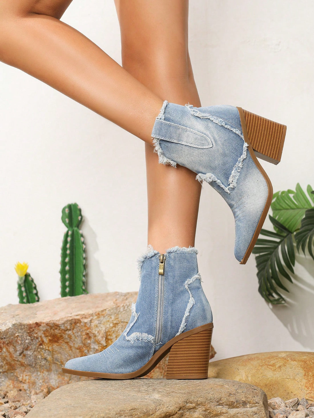 Step into the wild side with these show-stopping vintage western ankle boots! Featuring a distressed leather finish that screams authentic cowgirl charm, these beauties combine classic riding boot style with modern convenience. The sleek side zipper makes slipping them on effortless, while the high heel adds serious attitude to any outfit. Perfect for channeling your inner outlaw—whether you're hitting the honky-tonk or just turning heads on the street. Saddle up and ride into style!