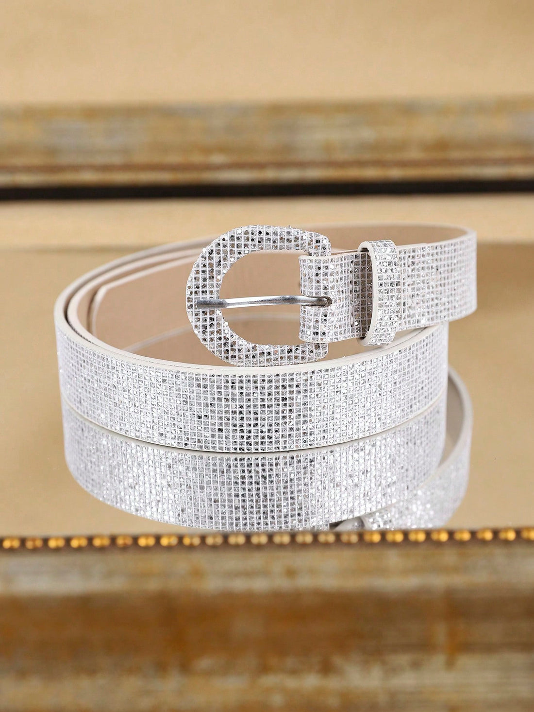 This Chic Bohemian Glitter Buckle Waist Belt is a stylish and versatile accessory that adds a touch of glamour to any outfit. Made from high-quality PU material, it is both durable and fashionable. Elevate your everyday fashion with this must-have accessory.