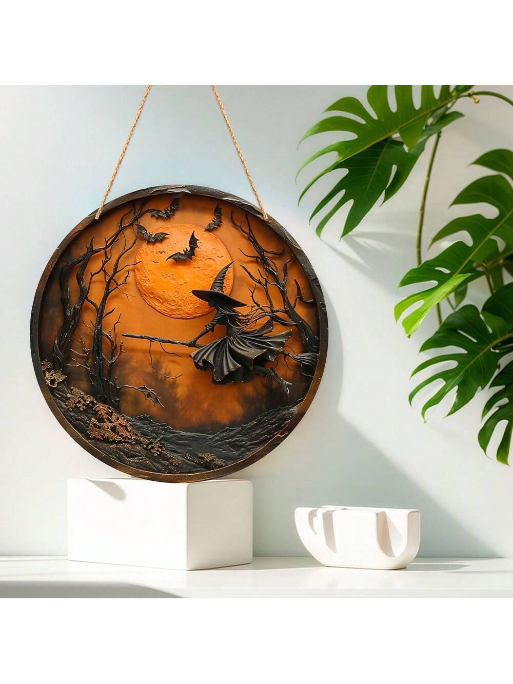 This Spooky Witch Acrylic Hanging Ornament is perfect for adding a touch of Halloween to your garden and home decor. Made of durable and weather-resistant acrylic, this ornament features a spooky witch design that will delight trick-or-treaters and guests alike. The perfect addition to your Halloween decorations!