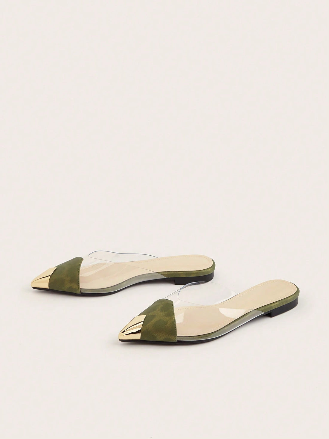 Elevate your summer style with these Chic and Trendy Transparent Flat Mule Sandals. Perfect for any outfit, these sandals add the perfect touch of trendiness and transparency to your look. Step out in confidence and make a statement with these must-have sandals.