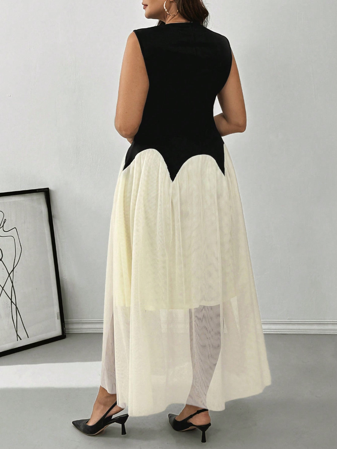 Celebrate Halloween in style with this Elegant Plus Size Color Block Mesh Dress. Designed for both the office and special nights out, it combines festive flair with flattering comfort. The playful color block and breathable mesh add a fun twist while keeping it chic and professional. Perfect for turning heads at work or on a date, this dress ensures you feel confident and festive all day and night.