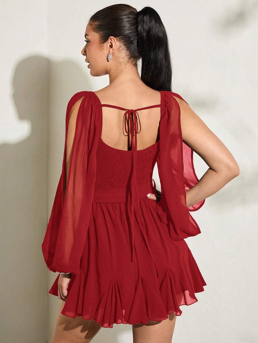 Back view red chiffon mini dress with open tie back shirred panel and sheer split sleeves
