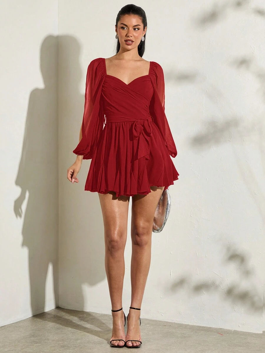 Red chiffon mini dress with long sheer sleeves wrap V bodice side bow and layered ruffle hem