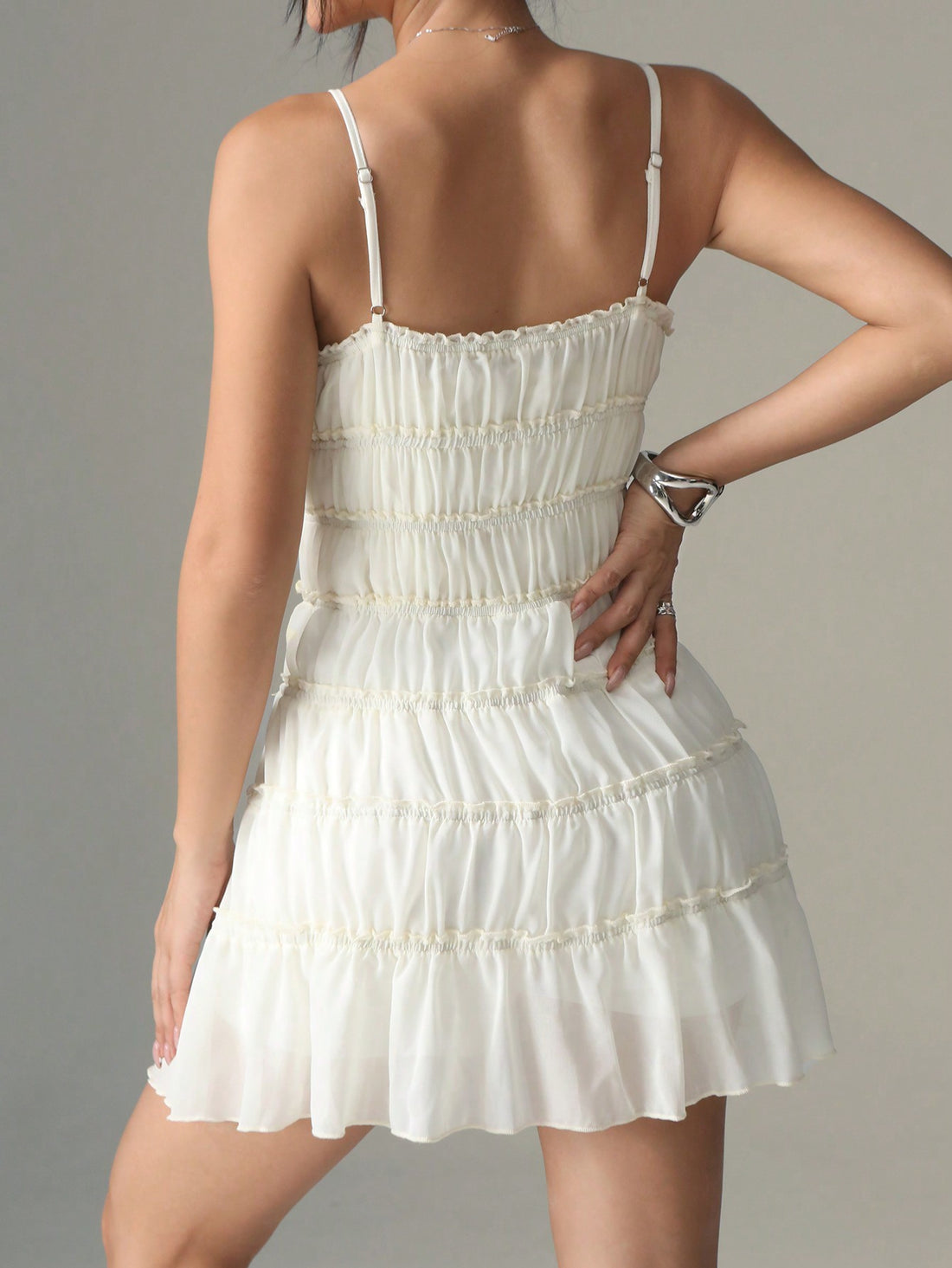 Enhance your wardrobe with our Chic & Effortless Solid Color Tie-Up Ruched Slip Dress. Made for modern women, this dress is both chic and effortless, featuring a tie-up design and ruched detailing for a flattering fit. Perfect for any occasion, this dress will elevate your style and confidence.