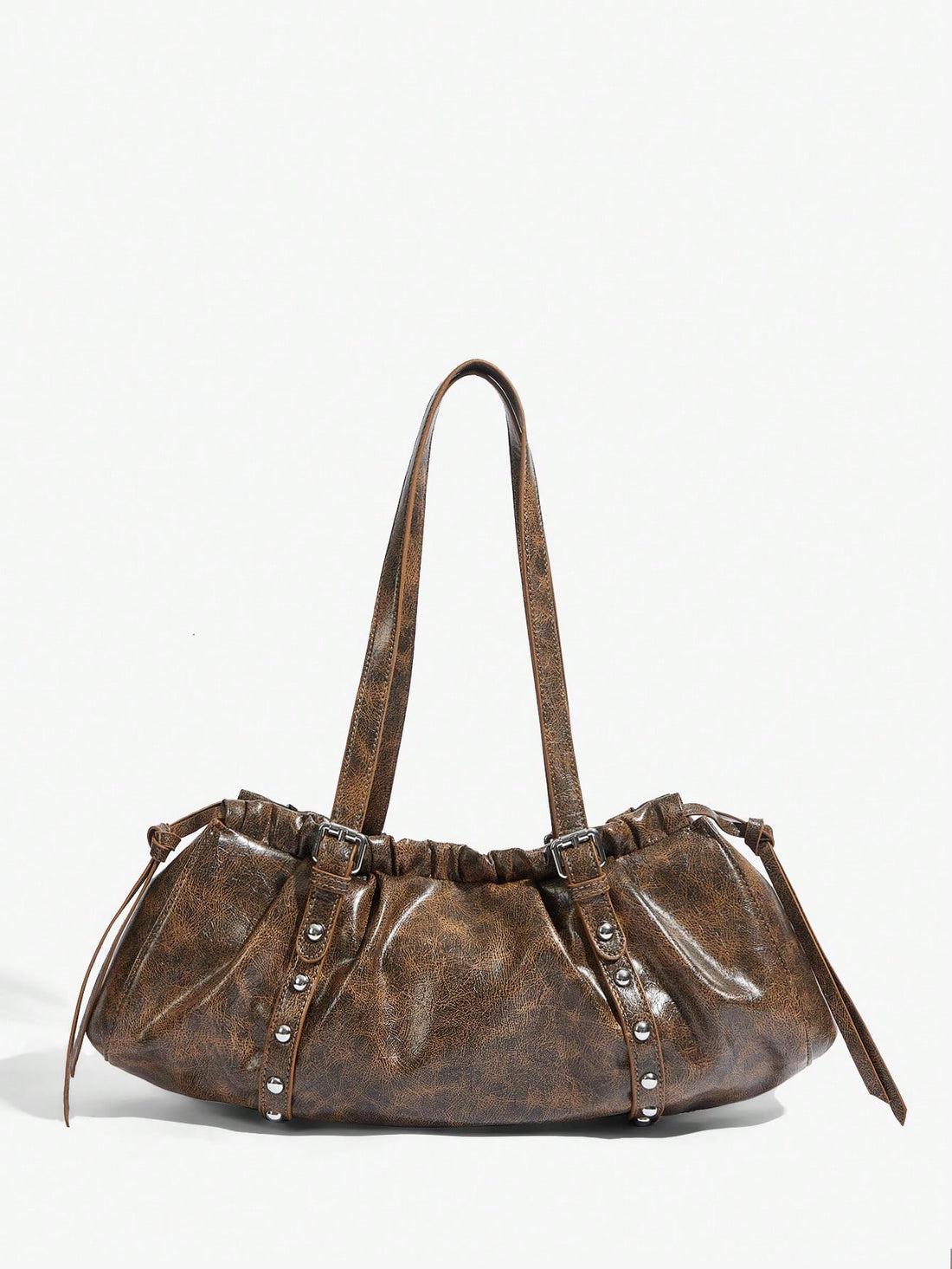 Effortlessly elevate your modern style with our Chic Y2K Vintage Rivet Hobo Bag. Its versatile design and trendy rivet detailing add a touch of sophistication to any outfit. With this stylish shoulder bag, you'll make a statement while staying organized and on-trend.