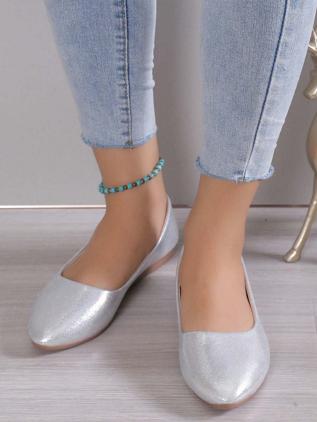 Step into style and comfort with these chic goldtone ballet flats! Designed for breathability and easy slip-on wear, they’re perfect for adding a touch of sparkle to your workday or casual outings. Lightweight and comfy, these flats keep your feet happy while you dance through your day with effortless flair.
