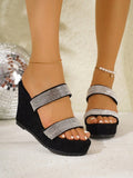 Top view of black wedge slide sandals with silver crystal strap rows