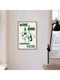 Framed green Wine & Dine graphic canvas print on a white wall