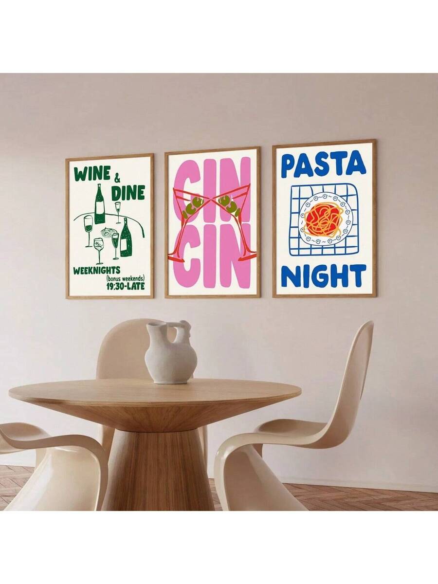 Three framed food and drink canvas wall art prints above a dining table