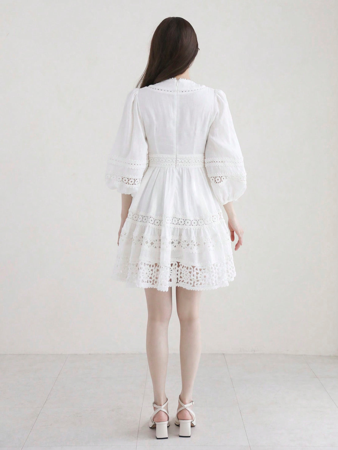 Experience timeless sophistication with our Elegant Lace Patchwork Midi Dress. The intricate lace detailing and patchwork design exude elegance and grace. Crafted with quality materials, this dress offers both style and comfort. Elevate your wardrobe with this versatile and timeless piece.