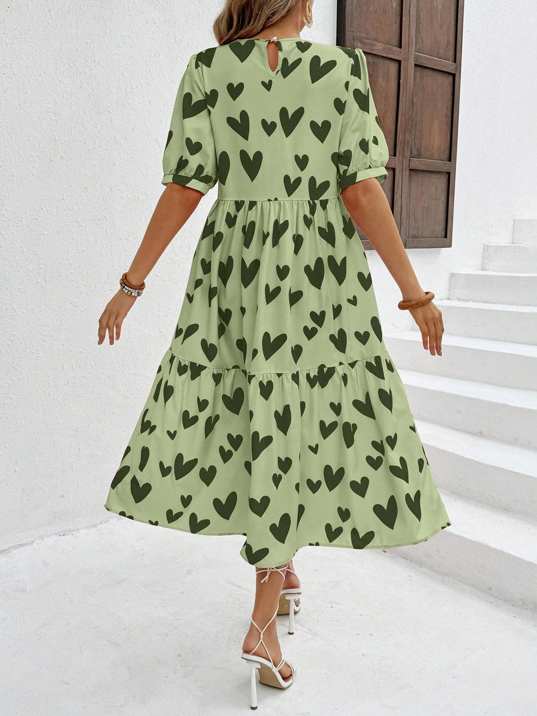 Elevate your everyday style with our Chic Heart Print Casual Dress. Designed for effortless wear, this dress features a charming heart print that adds a touch of fun to your look. Its comfortable fit makes it perfect for everyday wear and will have you feeling confident and stylish all day long.