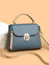 Vintage Chic: Retro Metal Flip Lock Handbag for Versatile Style